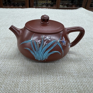 作品名称：新石瓢 泥料：原矿大红袍 容量：200cc  作者：周婷婷